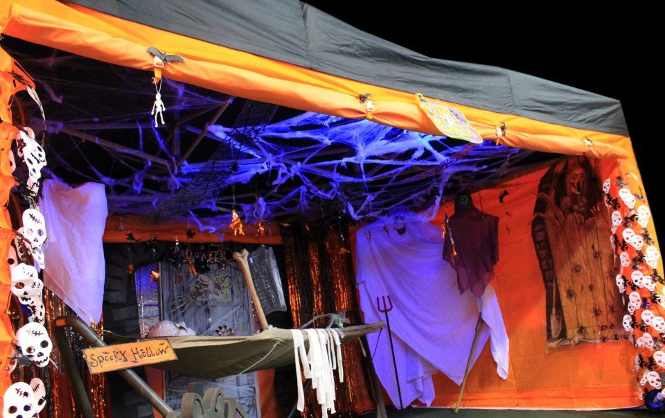 Branded event stand at a themed evening market