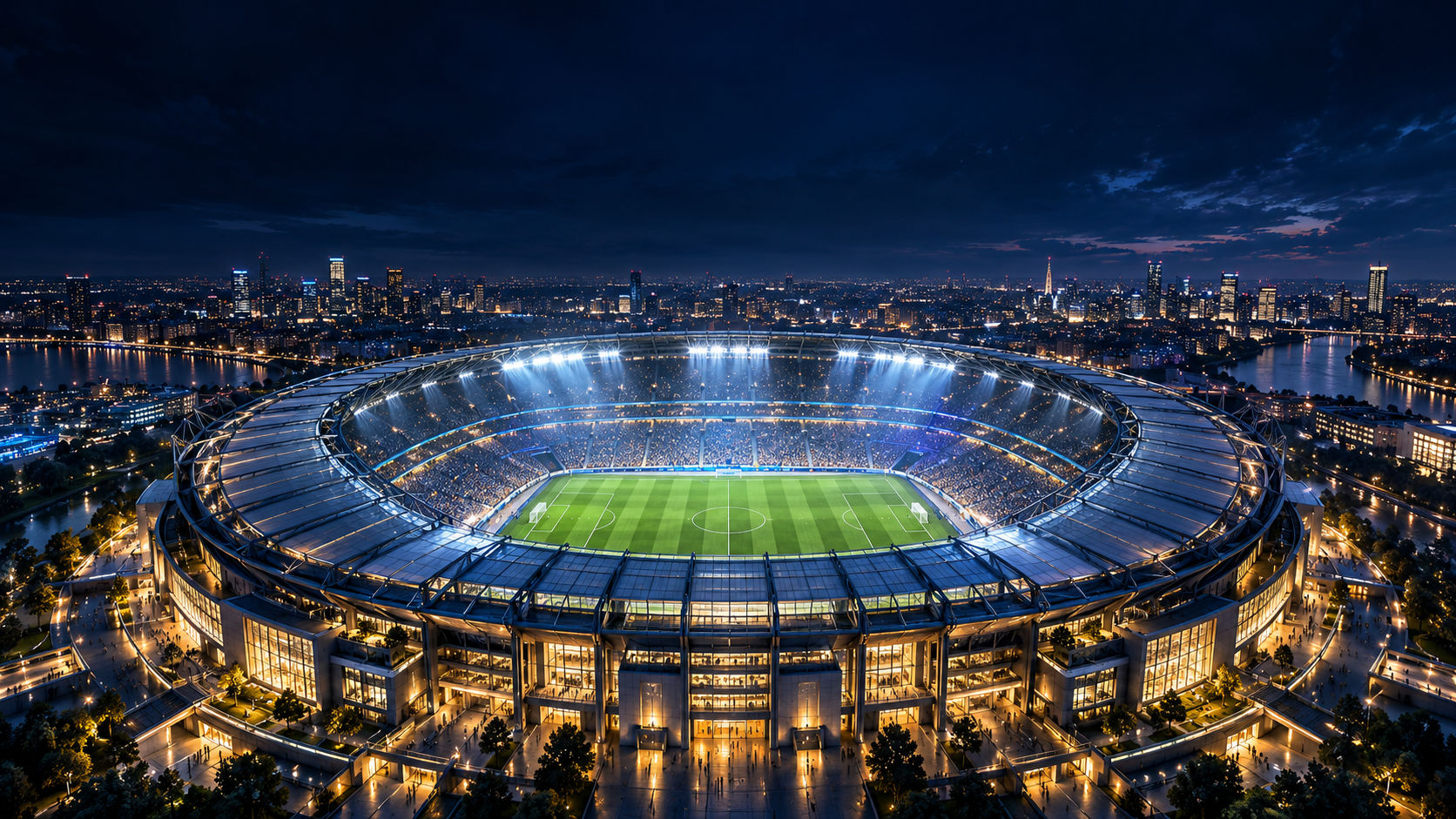 Floodlit football stadium at night with a city skyline behind it