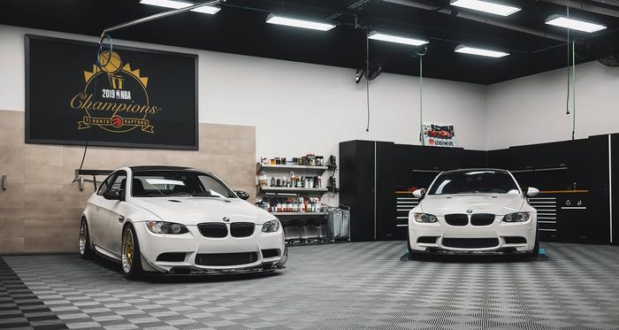 BMWs parked on a Swisstrax Ribtrax floor
