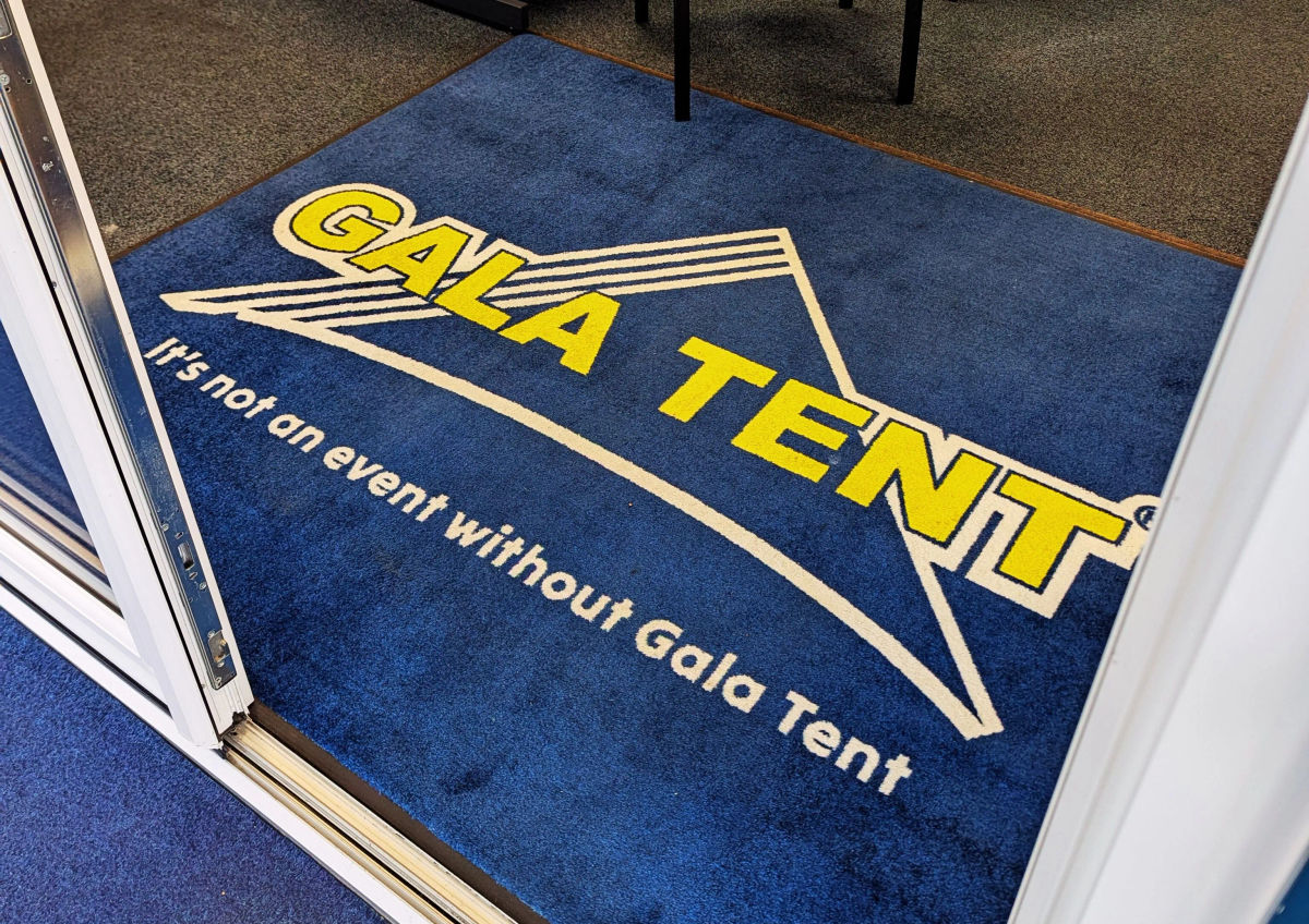 Branded motorsport marquee with printed canopy and walls