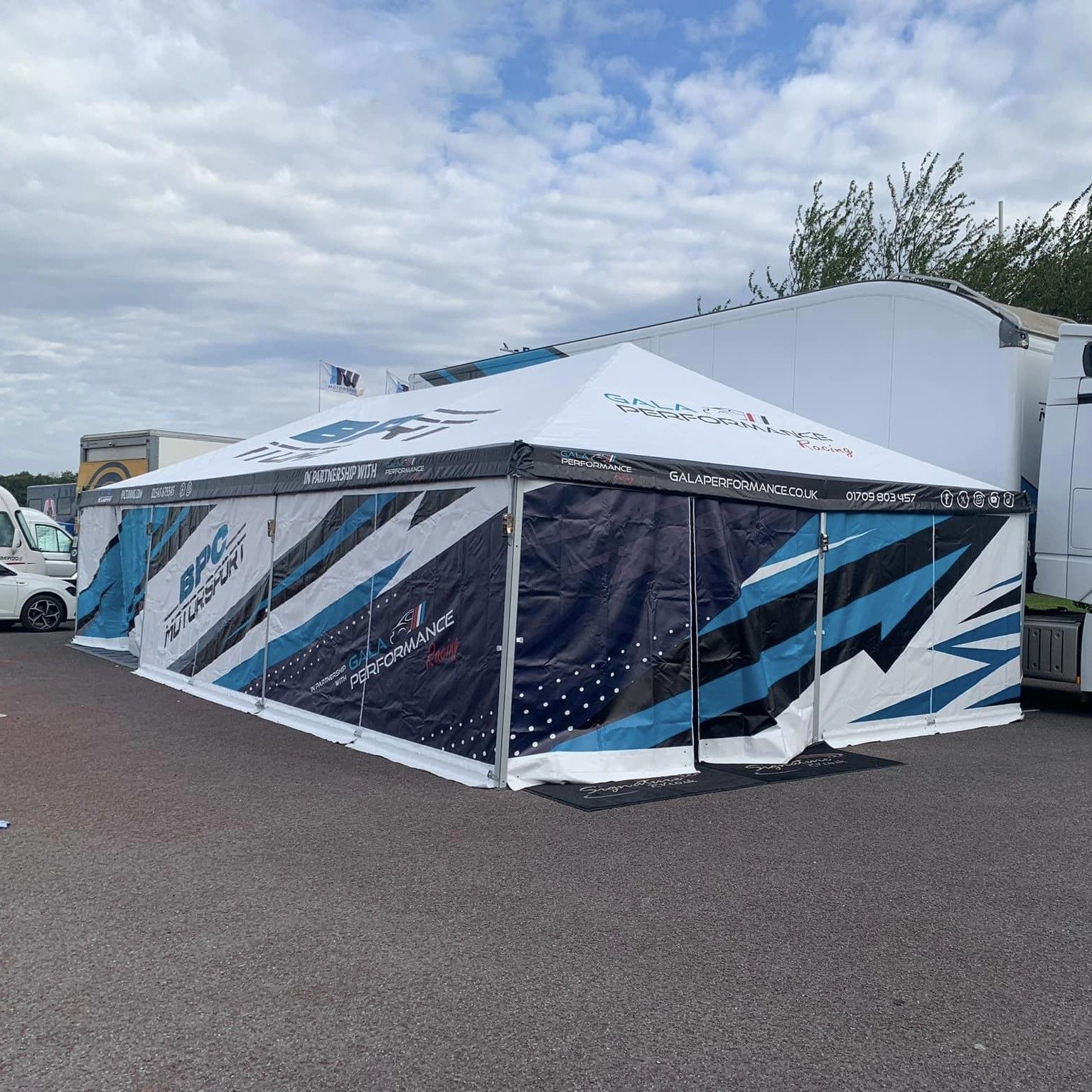 Branded MQ-65 race marquee