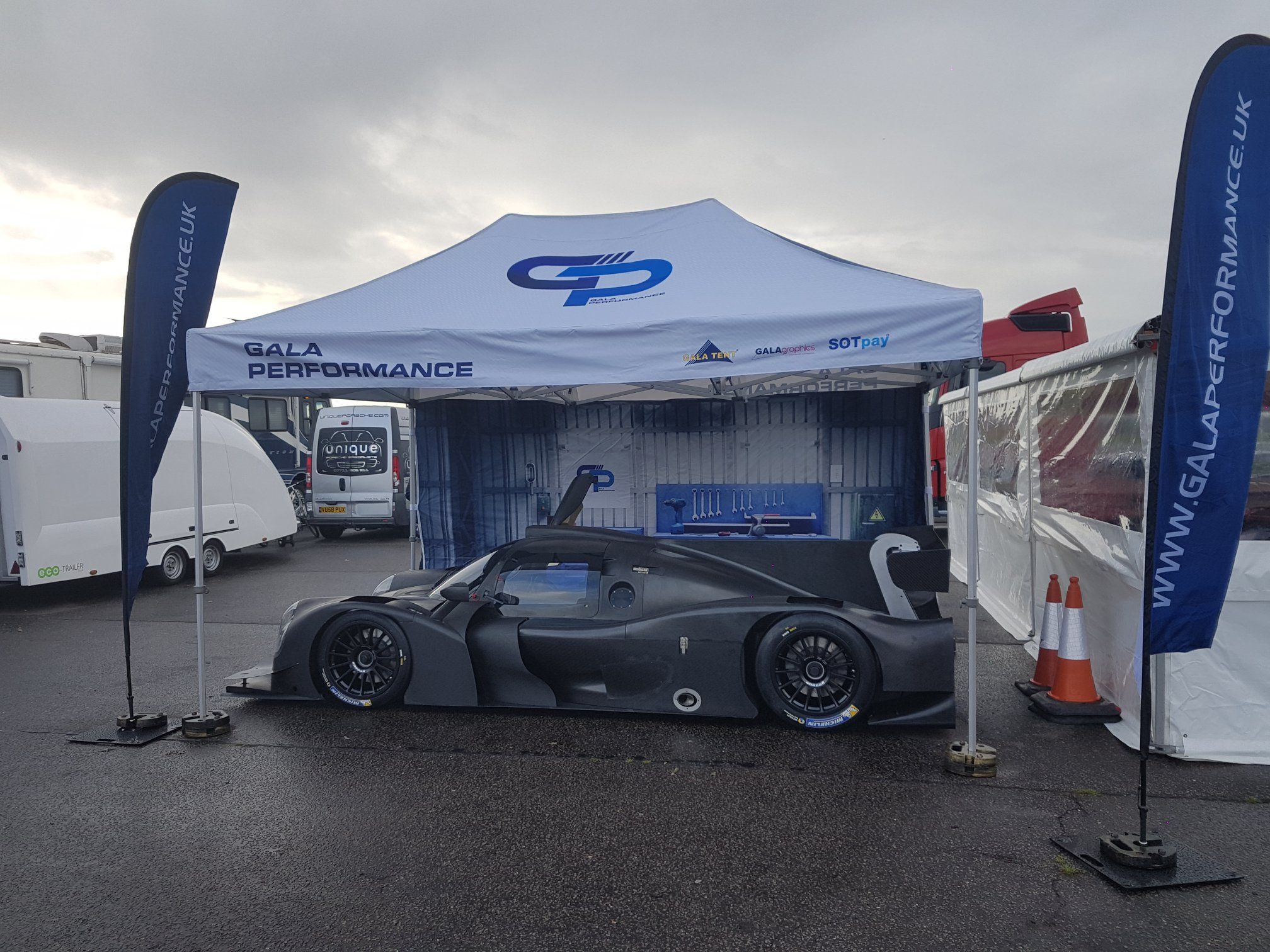 Branded racing gazebo in team colours