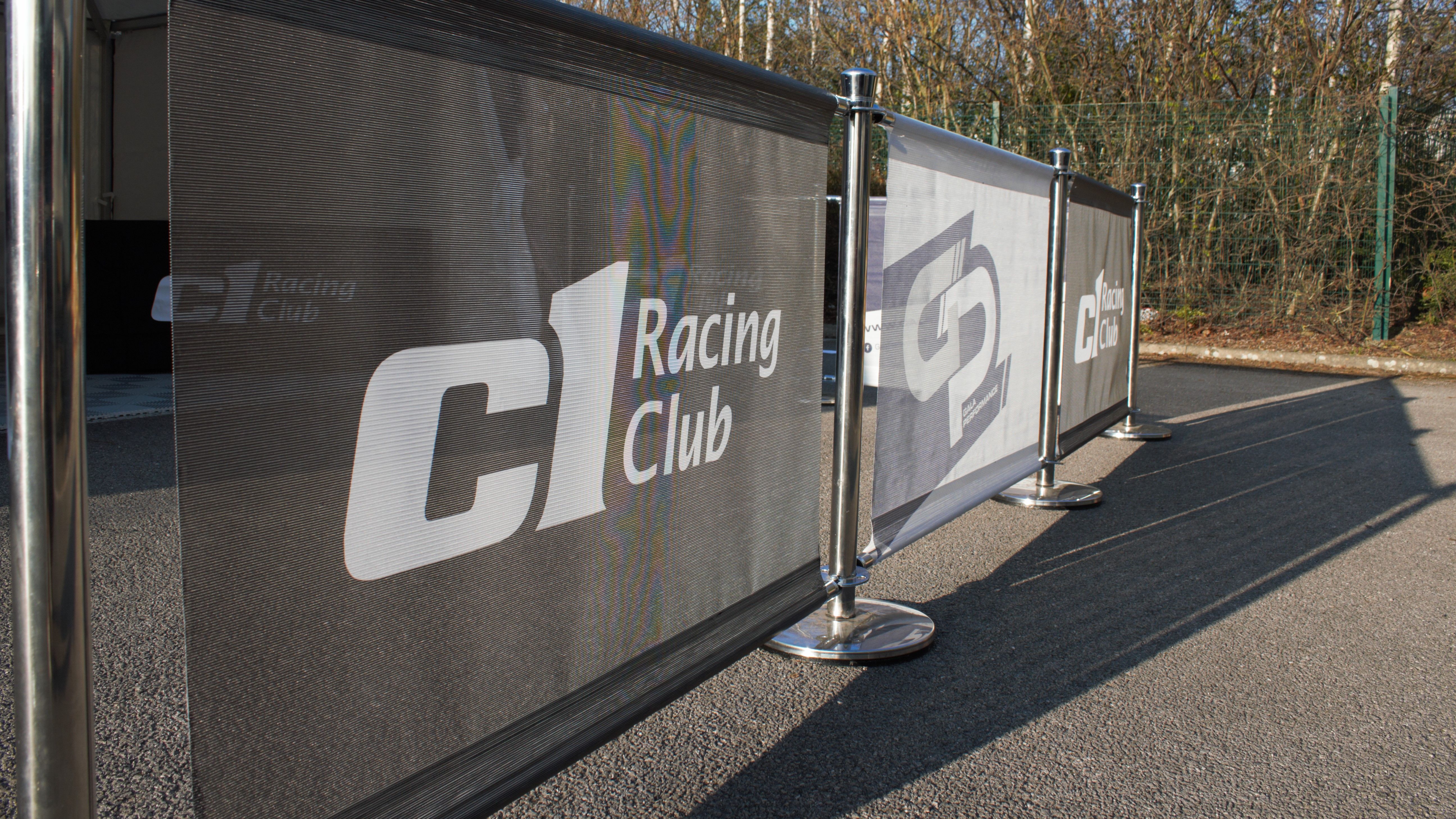 branded cafe barriers for C1 Racing Club