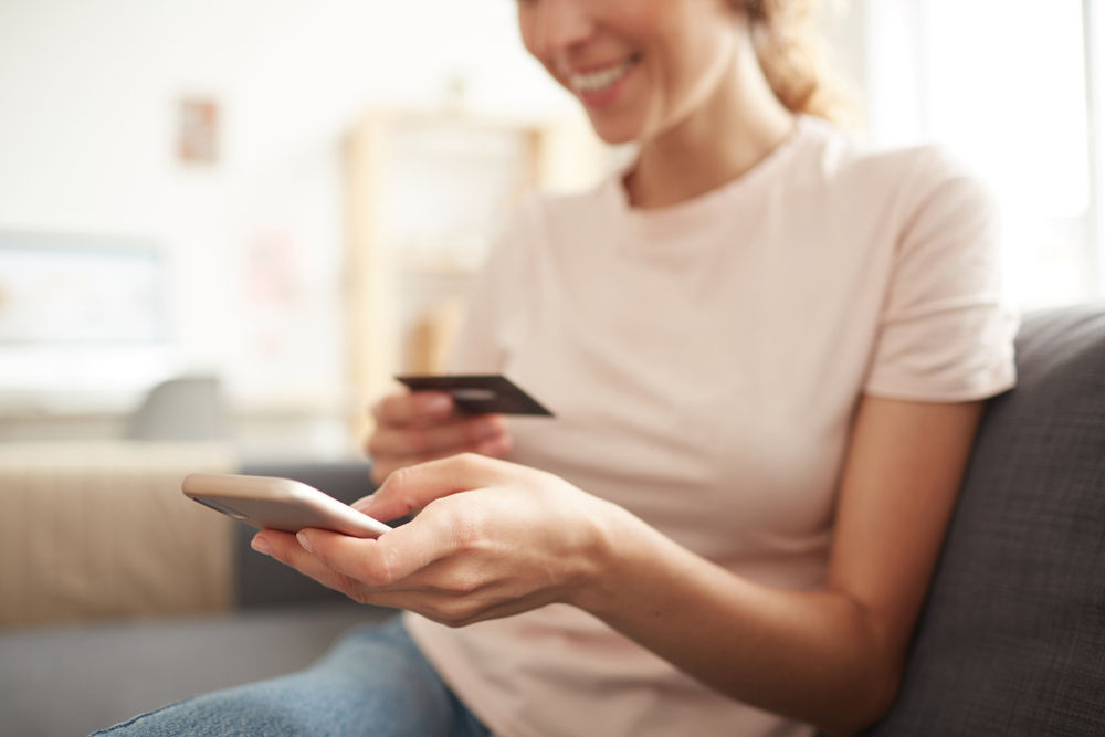 Hotel guest paying by secure link on their phone