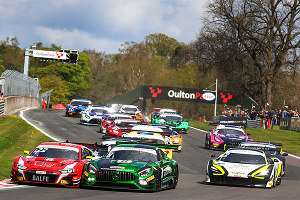 Car cresting a rise at Oulton Park