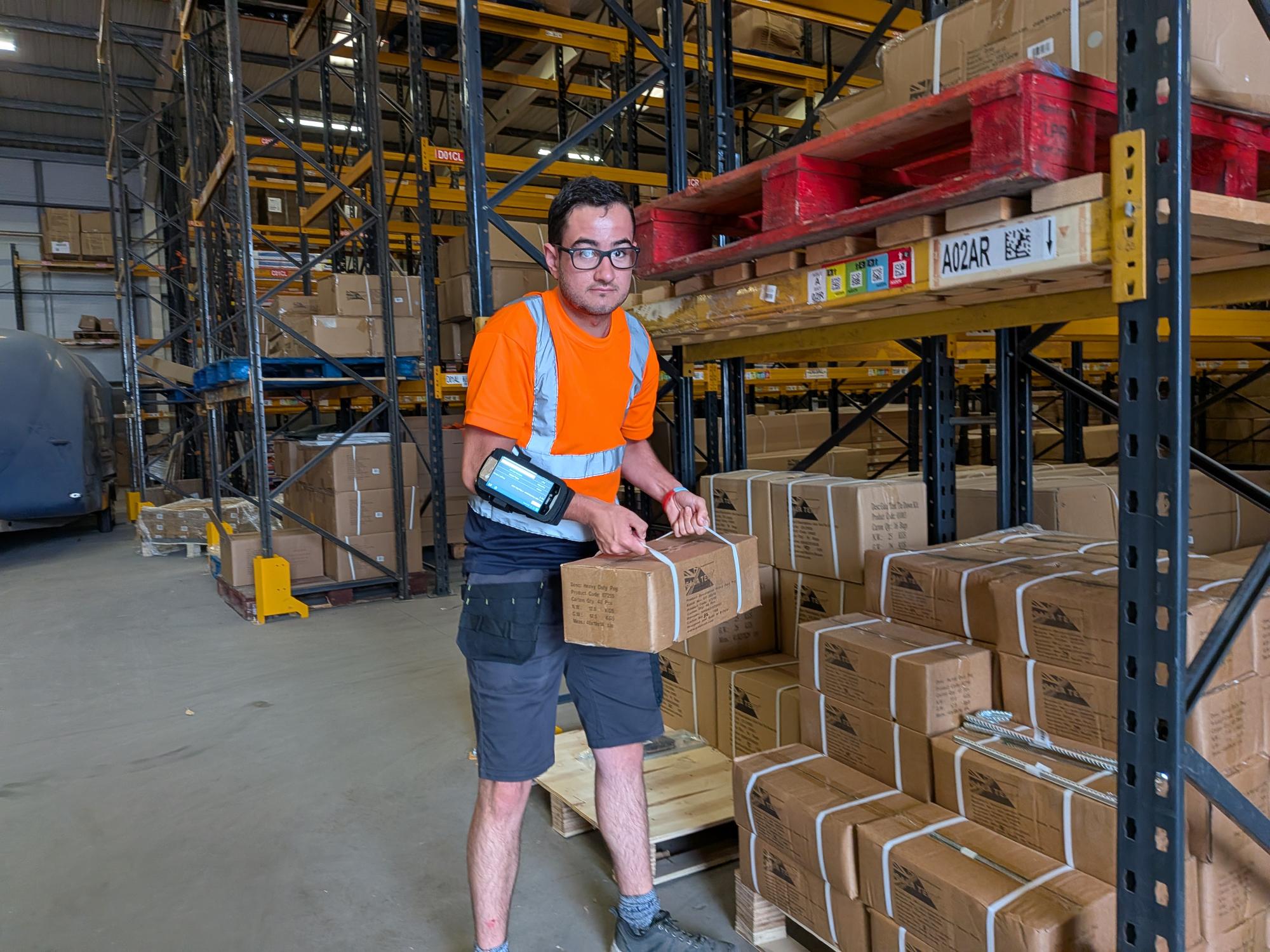 Member of the Gala Tent warehouse team with high-vis shirt