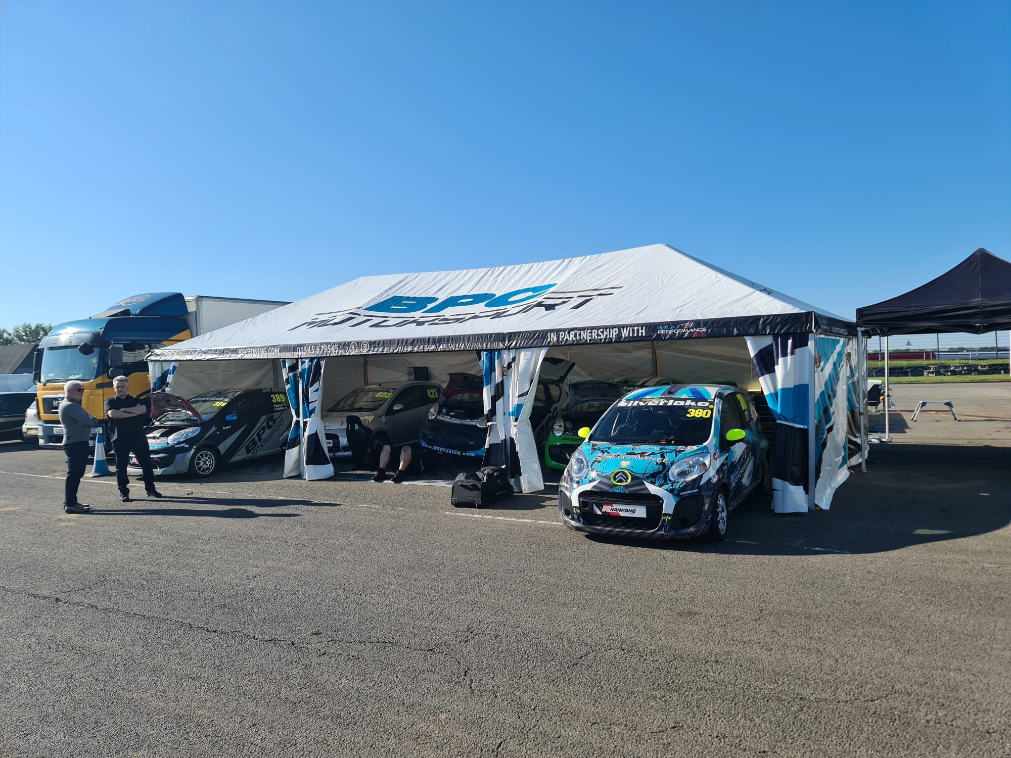 Heavy duty motorsport awning in a race paddock
