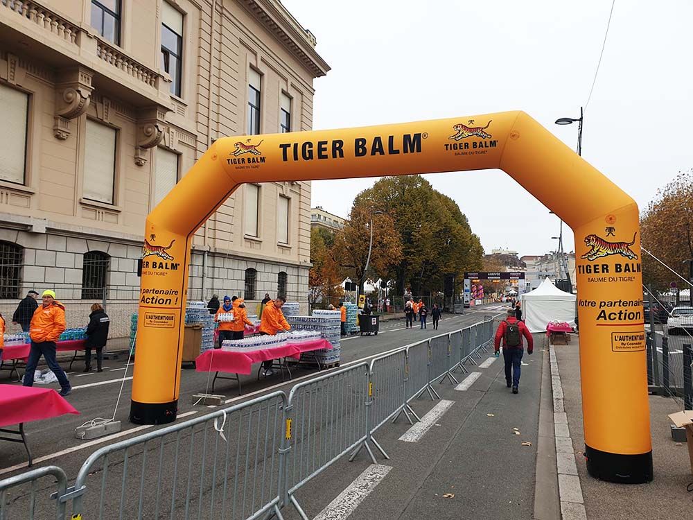 orange inflatable arch over road