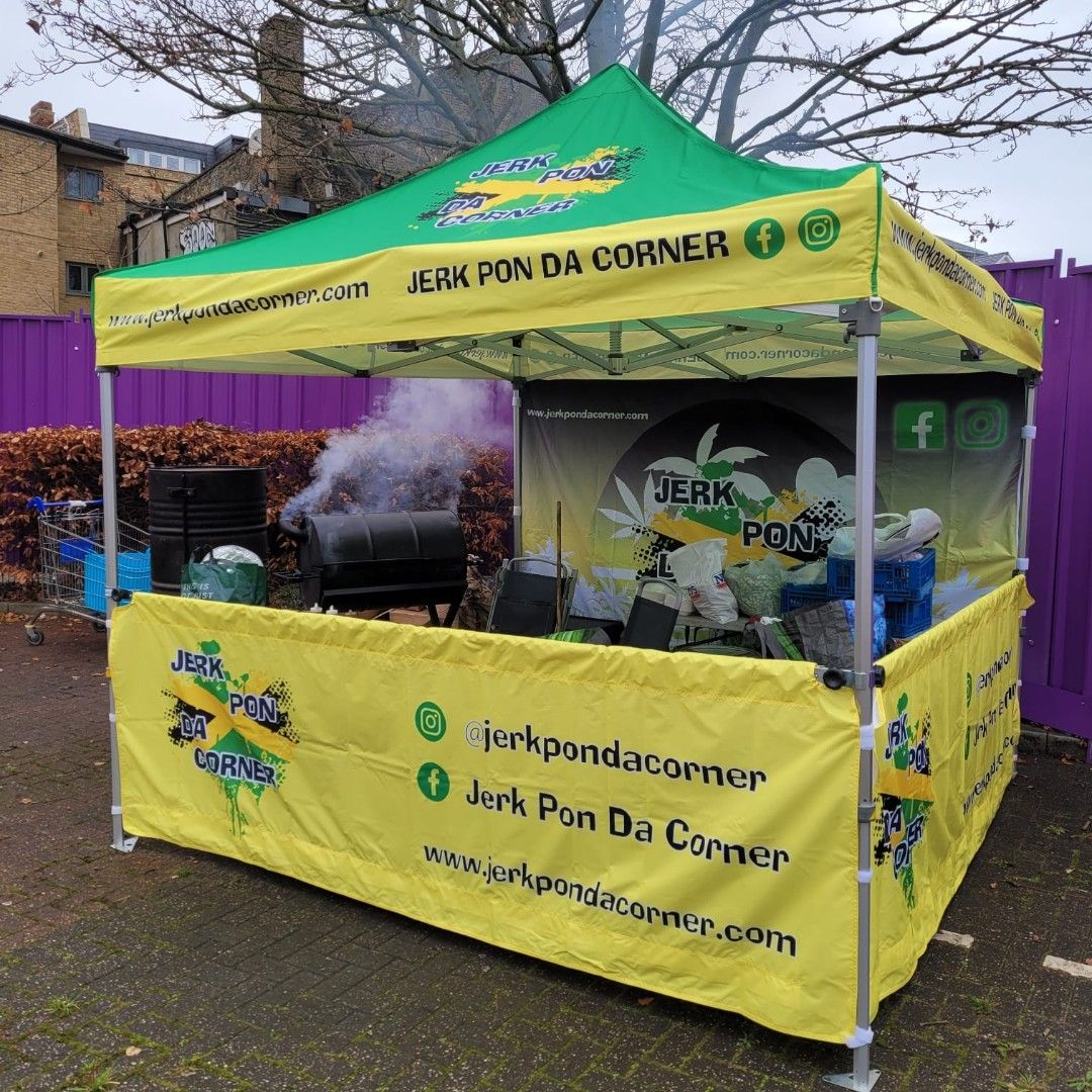 Jerk Pon Da Corner street food gazebo with social media tags