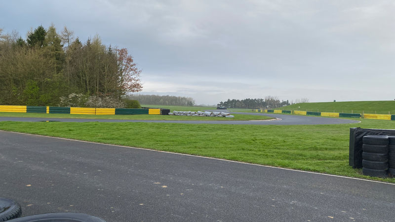 Car through the Jim Clark Esses at Croft