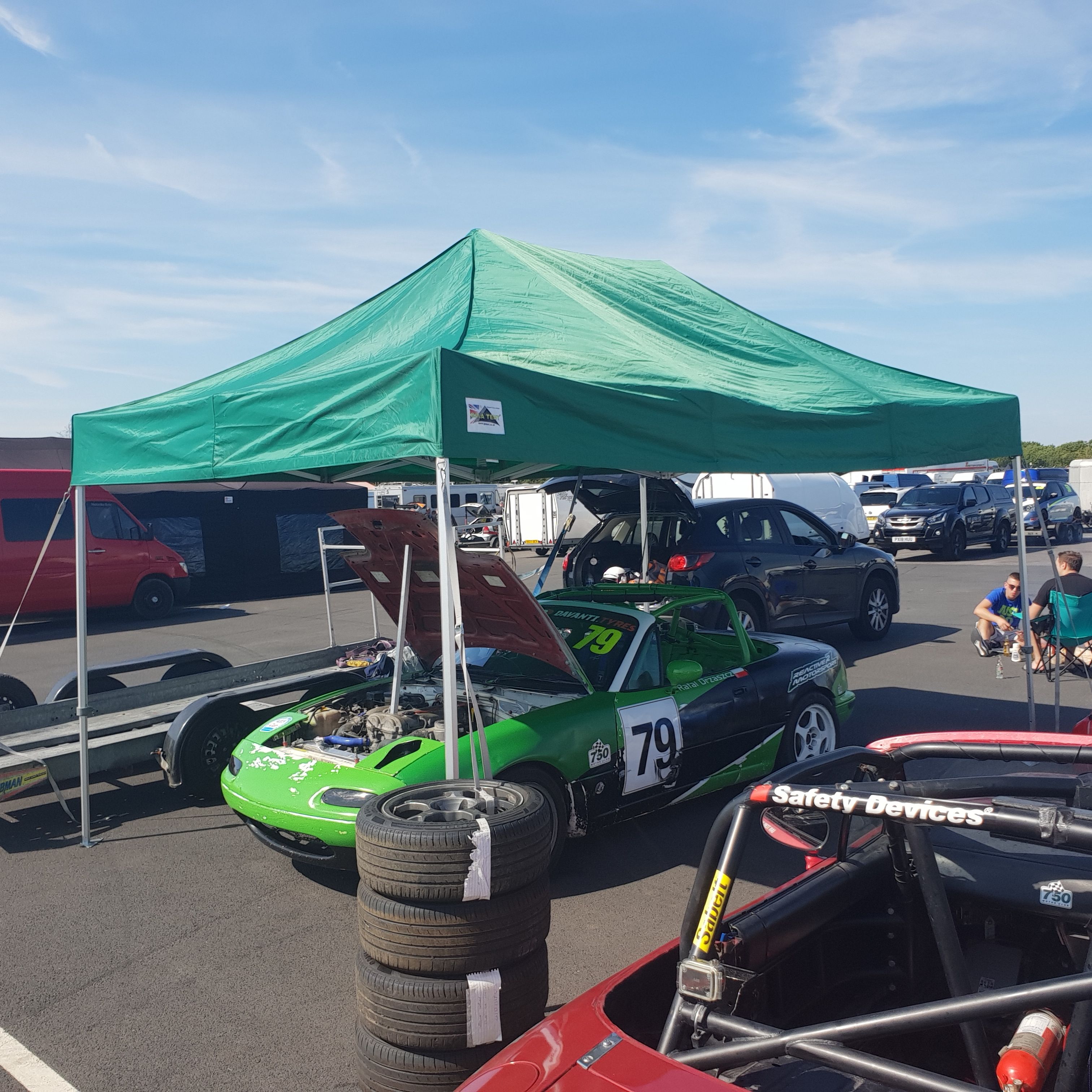 Open, exposed airfield paddock at Thruxton