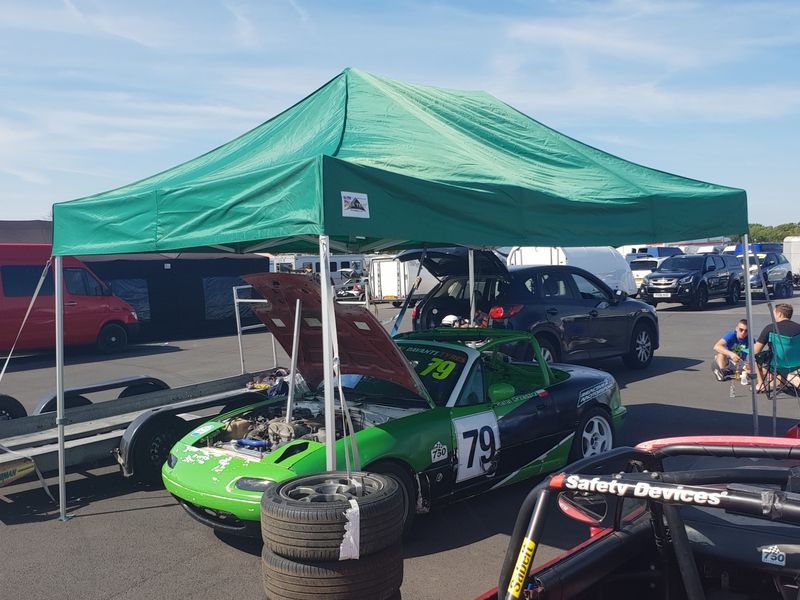 Open, exposed airfield paddock at Thruxton