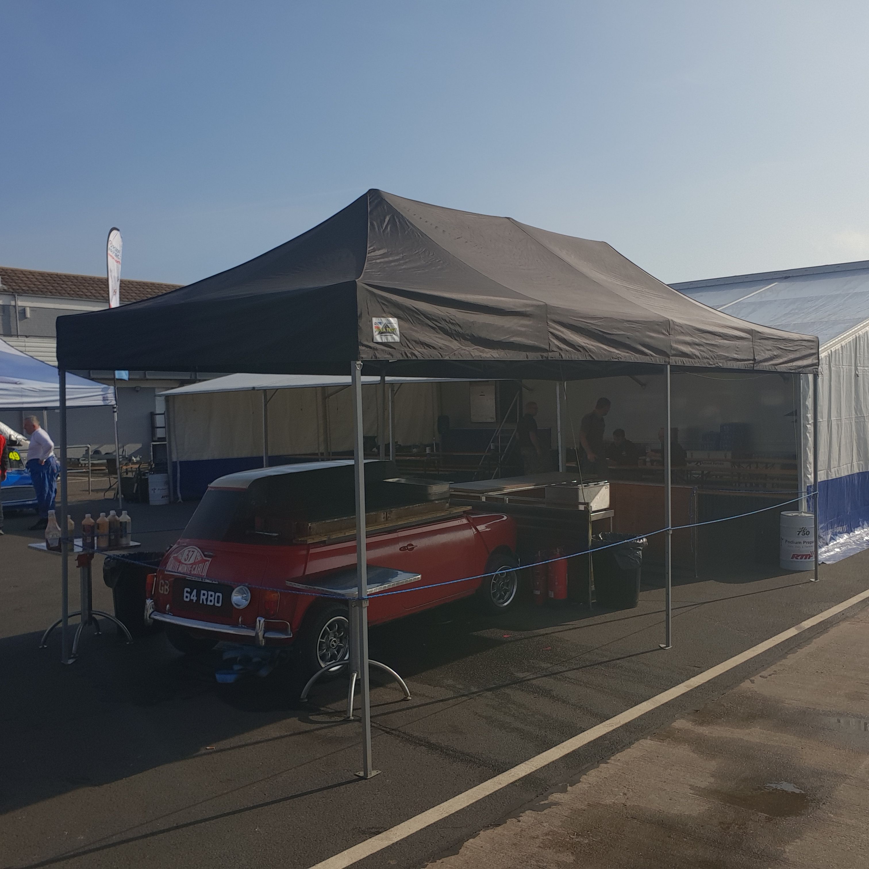 Race gazebo cover being dried before storage