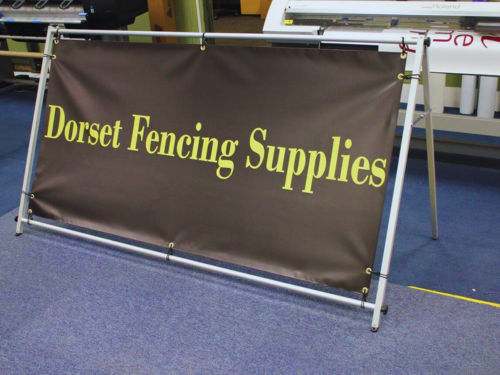 A promotional outdoor banner for Dorset Fencing Supplies